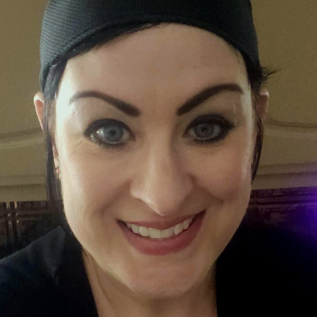 Woman with black headband on.